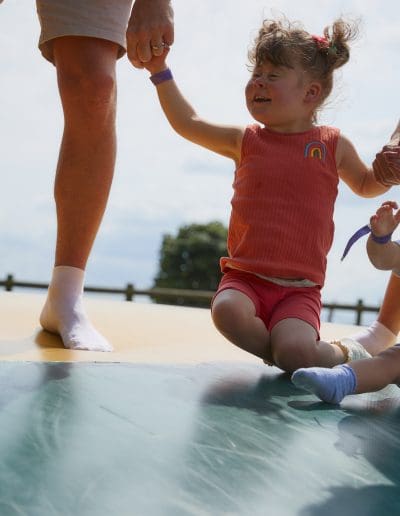 A family enjoying a visit to Cotswold Farm Park 10