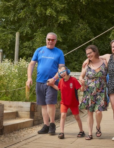 A family enjoying a visit to Cotswold Farm Park 4