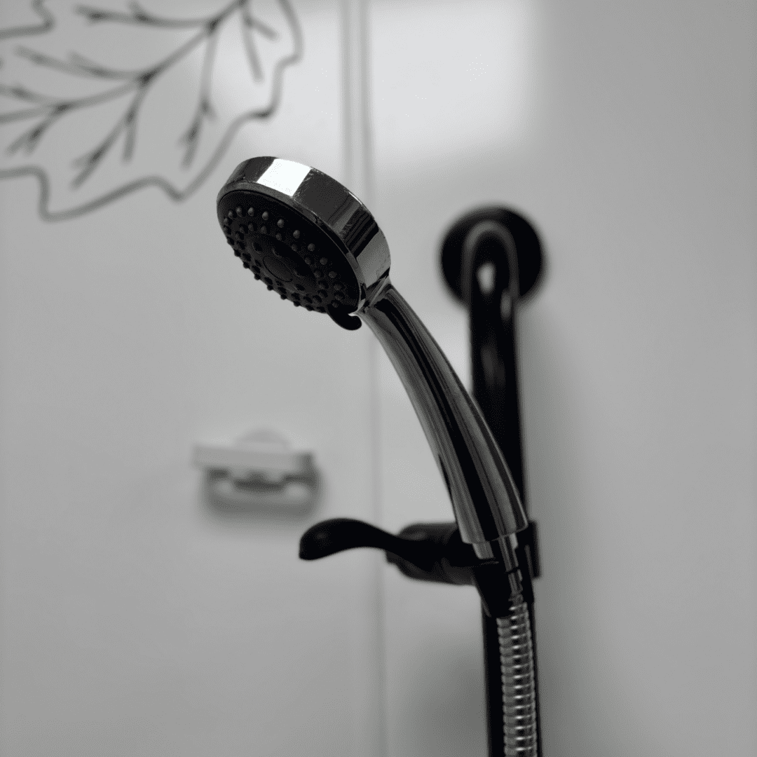 a shower head with a hose